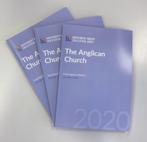 A photograph of the Independent Inquiry into Child Sexual Abuse report into the Anglican Church in England and Wales