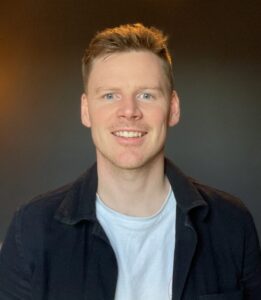 Image shows Nick Johnson looking at the camera.