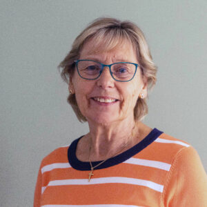 A person looking at the camera smiling