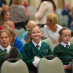 Children sat in the congregation.