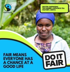 Image show a person smiling at the camera. there is green shrubbery behind them. The Fairtrade log is top left. Below is a green black and blue swirl with words: "Fair means everyone has a chance at a good life."