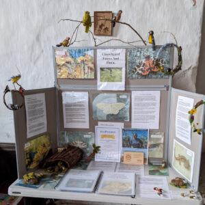 A display board on a white table.