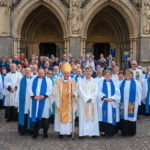A group of people outside the cathedral in Truro.
