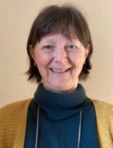 Image shows Helen Uglow smiling.