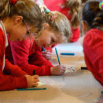 Children doing crafts.