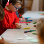 Children doing Advent crafts.