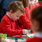 Children doing Advent crafts.