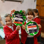 Two children with their advent wreath craft