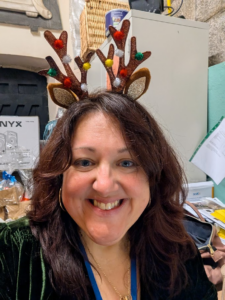 Rebecca wearing some Christmas antlers