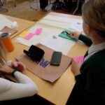 Children sat at a desk