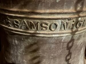 A close up of an historic bell.