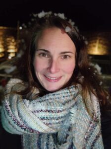 Beth smiling at the camera