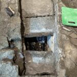 Middle tomb with first stone removed.