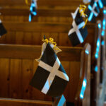 St Piran flags on the end of pews.