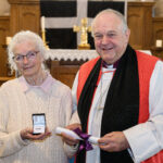 Bishop David with a recipient of the Cross of St Piran.