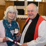 Bishop David with a recipient of the Cross of St Piran.