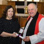 Bishop David with a recipient of the Cross of St Piran.