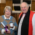 Bishop David with a recipient of the Cross of St Piran.
