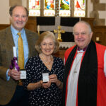 Bishop David with a recipient of the Cross of St Piran.