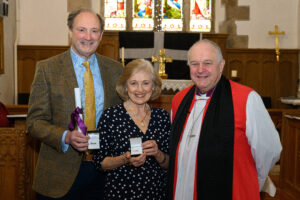 Bishop David with a recipient of the Cross of St Piran.