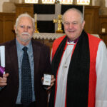 Bishop David with a recipient of the Cross of St Piran.