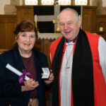 Bishop David with a recipient of the Cross of St Piran.