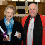 Bishop David with a recipient of the Cross of St Piran.