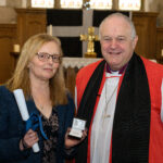 Bishop David with a recipient of the Cross of St Piran.