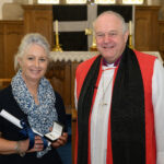 Bishop David with a recipient of the Cross of St Piran.