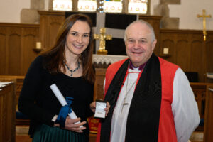 Bishop David with a recipient of the Cross of St Piran.