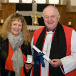 Bishop David with a recipient of the Cross of St Piran.