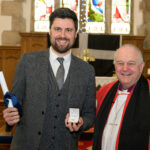 Bishop David with a recipient of the Cross of St Piran.
