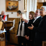 People singing in the church