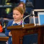 Childspeaking from the pulpit.