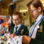 Two children taking part in a workshop.