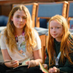 Two children looking at the camera.