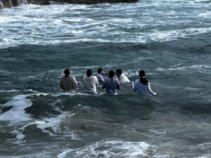 A group of people in the sea
