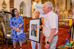 Three people and art in the church